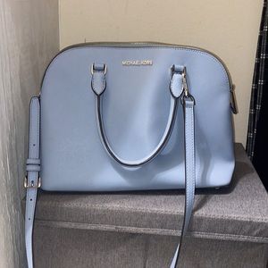 Baby blue Michael Kors handbag with strap